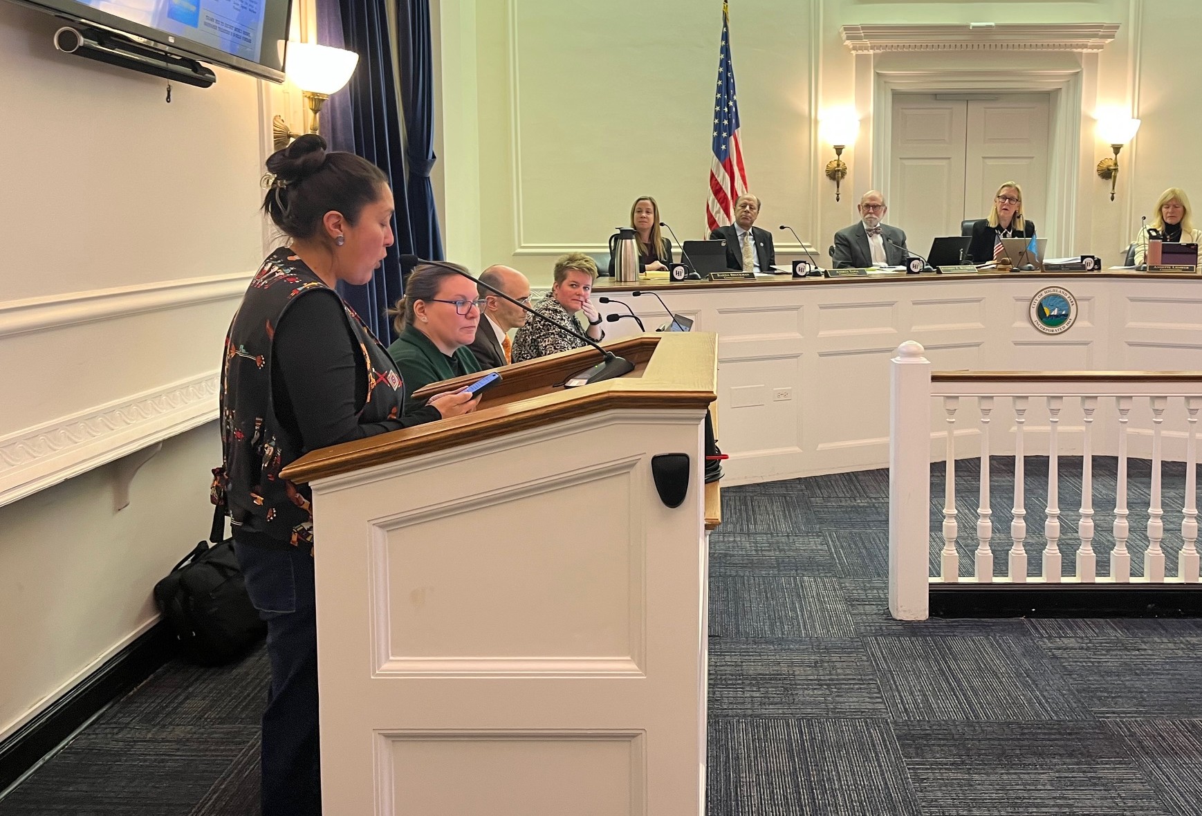 Highland Park City Council members listen as Ashbey Beasley spoke about Native American culture and heritage.
